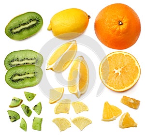 healthy food. mix sliced lemon, orange, mandarin and kiwi fruit with green leaf isolated on white background. top view