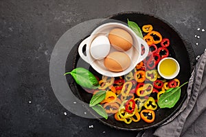 Healthy food nutrition. Ingredients for vegetable wholesome frittata: capsicum pepper, mushrooms, basil, garlic, organic