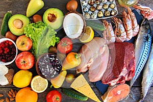 Healthy food on old wooden background.