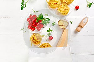 Healthy food in paper bag, Ingredients for cooking Italian pasta