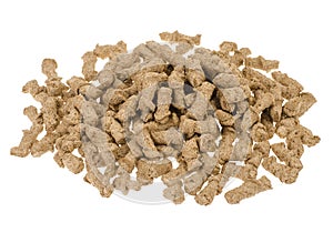 Healthy food products. Extruded rye bran on white background