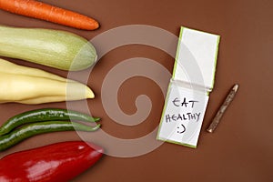 Healthy Food: Raw vegetables and message `Healthy and Happy :`