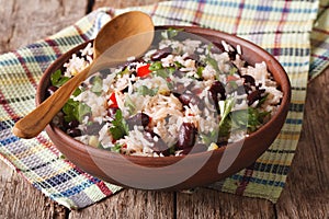 Healthy food: rice with red beans in a bowl close-up. horizontal