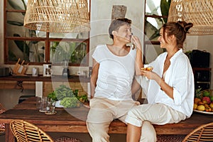 Healthy Food. Romantic Couple At Kitchen In Tropical Villa. Woman And Man Having Fun While Cooking Food For Lunch.