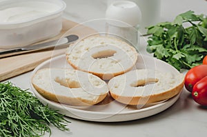 Healthy food with round toast, bottle, vegetables and cheese/Healthy food with round toast, bottle, vegetables and cheese on white