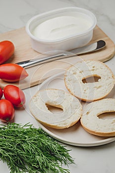 Healthy food with round toast, bottle, vegetables and cheese/Healthy food with round toast, bottle, vegetables and cheese on white