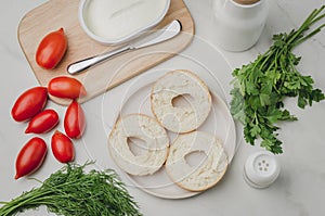 Healthy food with round toast, bottle, vegetables and cheese/Healthy food with round toast, bottle, vegetables and cheese on white