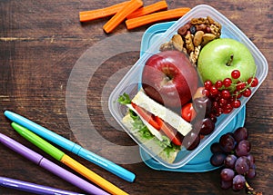 healthy food school lunch box with fruits vegetables