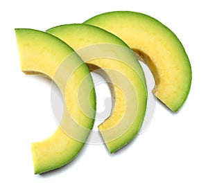 healthy food. sliced avocado on white background. top view photo