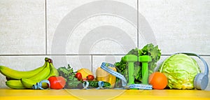 Healthy food and sports fitness equipment for slimming women using a slimming tap on a light background. Healthy sport concept