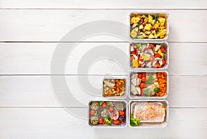 Healthy food take away, top view at wood background