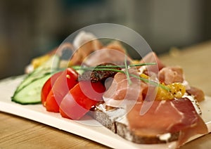 Healthy food -tartine with prosciuto photo