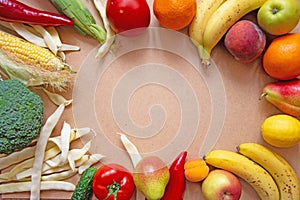 Healthy food. Vegetables and fruits on wood background. Banner Top view. Free space for your text.