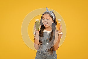 Healthy food. Vitamin nutrition. Fresh smoothie. Girl drinking orange fresh juice smoothie. Vegetarian concept. Hand