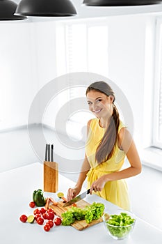 Healthy Food. Woman Cutting Vegetables. Salad, Food Preparation.