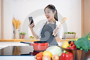 Healthy food, Young asian beautiful woman preparing food in kitchen at home