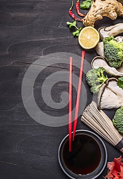 Healthy foods, cooking concept Japanese buckwheat noodles with ginger, oyster mushrooms, soy sauce wooden rustic background to