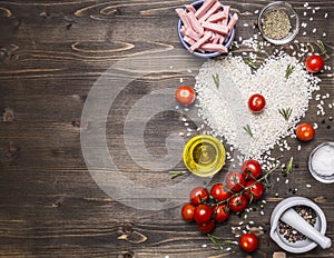 Healthy foods, cooking and concept risotto with ham, oil, cherry tomatoes, rice tiled heart, valentines day border ,place text