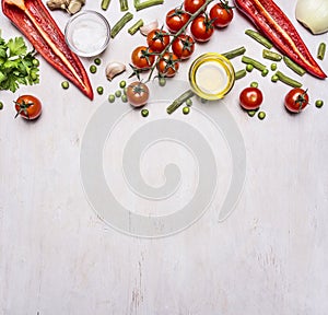 Healthy foods, cooking and vegetarian concept summer vegetables border ,place for text wooden rustic background top view