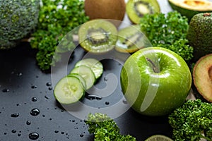 Healthy Foods. Organic and Fresh green vegetable for detox, diet and weight loss on the old wooden.