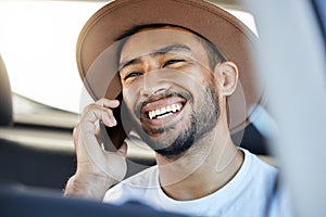 Healthy, free, the world before me. a young man sitting in a car while using his phone.