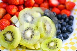 Healthy fresh fruit strawberry, raspberry, blueberry, kiwi