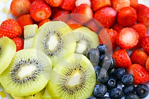 Healthy fresh fruit strawberry, raspberry, blueberry, kiwi