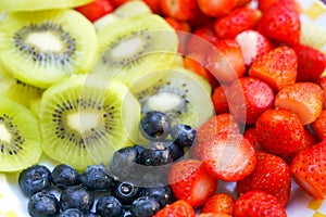 Healthy fresh fruit strawberry, raspberry, blueberry, kiwi