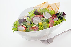 Healthy fresh mixed salad and crisp flatbread