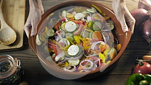 Healthy fresh mixed vegetables in a clay pot