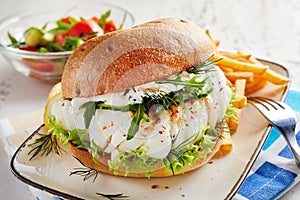 Healthy fresh seafood burger with fish fillet