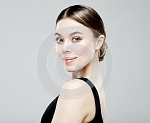 Healthy fresh skin face, beautiful woman close up face with clean skin over grey background