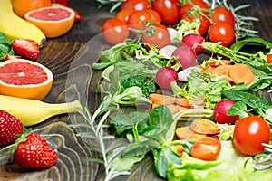 Healthy fresh vegetarian food, fresh organic fruit and vegetable on rustic table