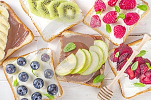 Healthy fruit and berry sandwiches