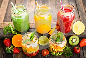 Healthy fruit and vegetable salad and smoothies