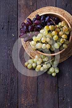 Healthy fruits Red and White wine grapes on wooden backgrounds