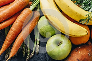 Healthy fruits and vegetables delivery from farm market. Organic food ingredients for diet vitamin smoothie recipe. Top view of