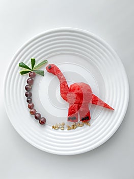 Healthy and fun food for kids, serving food for kids, dinosaurs and palm trees