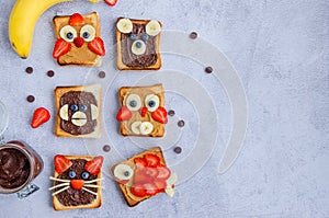 Healthy funny face sandwiches for kids. Animal faces toast with peanut and hazelnat chocolate butter