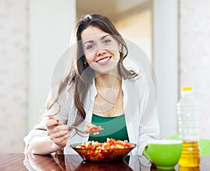 Healthy girl eating vegetarian lunch