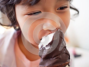 Healthy girl smiling and enjoying life. eating icecream.