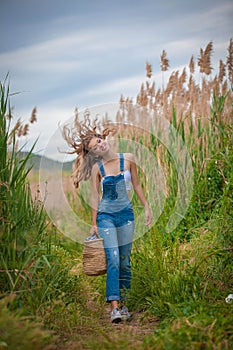 Healthy girl walking in countryside