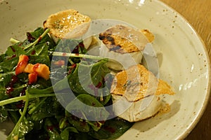 Healthy gourmet appetizer fried goat cheese and spinach