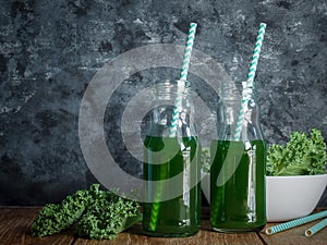 Healthy green smoothie with kale vegetable, detox drinking.