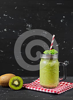 Healthy green smoothie with kiwi and spinach