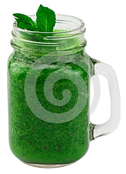 Healthy green smoothie with spinach in a jar mug isolated on whi