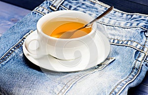 Healthy habits. Tea time concept. Cup mug hot water and bag of tea. Process tea brewing in ceramic mug. Herbal green or