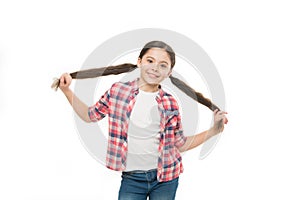 Healthy hair care habits. Kid happy smiling cheerful face with adorable hairstyle white background isolated. Strong hair