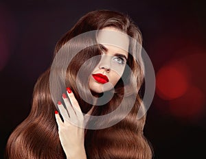 Healthy hair. Red lips & manicure. Wavy hair. Beautiful model gi