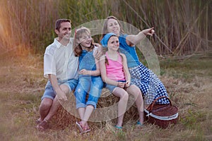 Healthy happy family outdoors in summer picnic